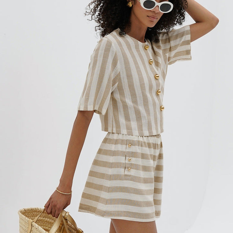 Trendy striped shirt and shorts suit for a stylish, easygoing look. Perfect for a chic and comfortable summer day