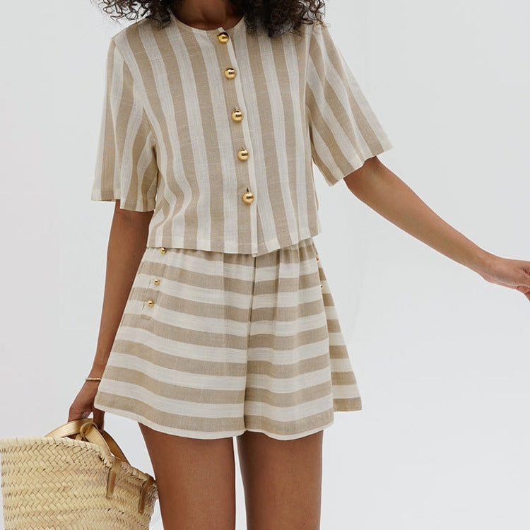 Trendy striped shirt and shorts suit for a stylish, easygoing look. Perfect for a chic and comfortable summer day