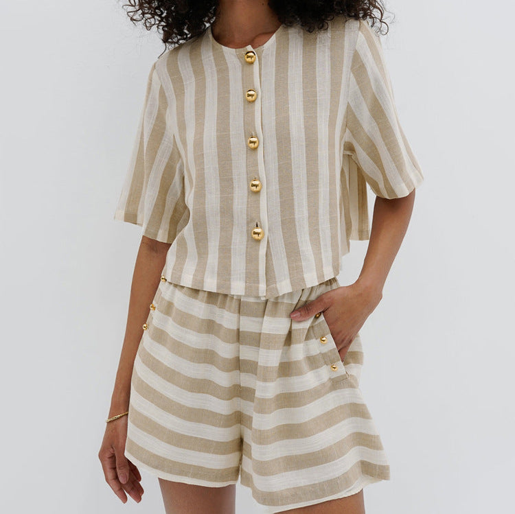 Trendy striped shirt and shorts suit for a stylish, easygoing look. Perfect for a chic and comfortable summer day