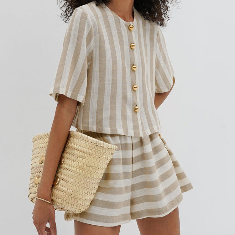 Trendy striped shirt and shorts suit for a stylish, easygoing look. Perfect for a chic and comfortable summer day