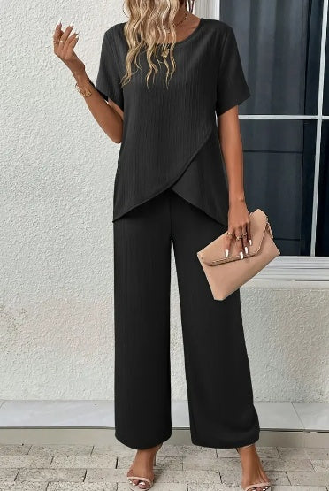 Sleek and comfortable 2-piece set with a crew neck top and long pants. Perfect for a polished yet relaxed everyday look.